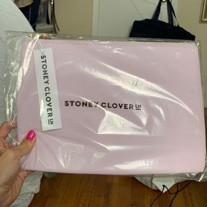 Brand new Stoney clover lilac flat pouch